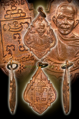 เหรียญหลวงพ่อรุ่ง วัดท่ากระบือ พิมพ์หน้าหนุ่มตาเม็ด เนื้อทองแดง ปี พ.ศ. 2484 แชมป์